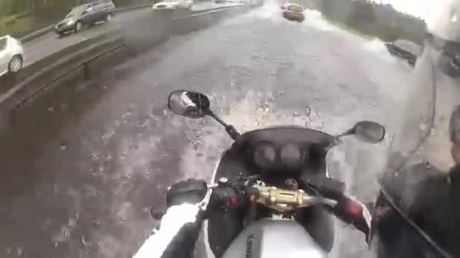 Kawasaki ER6 driver nearly crashed because of water flood