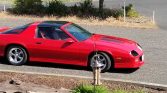 3rd gen red 1989 Chevrolet Camaro IROC 305 5spd For Sale