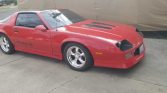 3rd gen red 1989 Chevrolet Camaro IROC 305 5spd For Sale